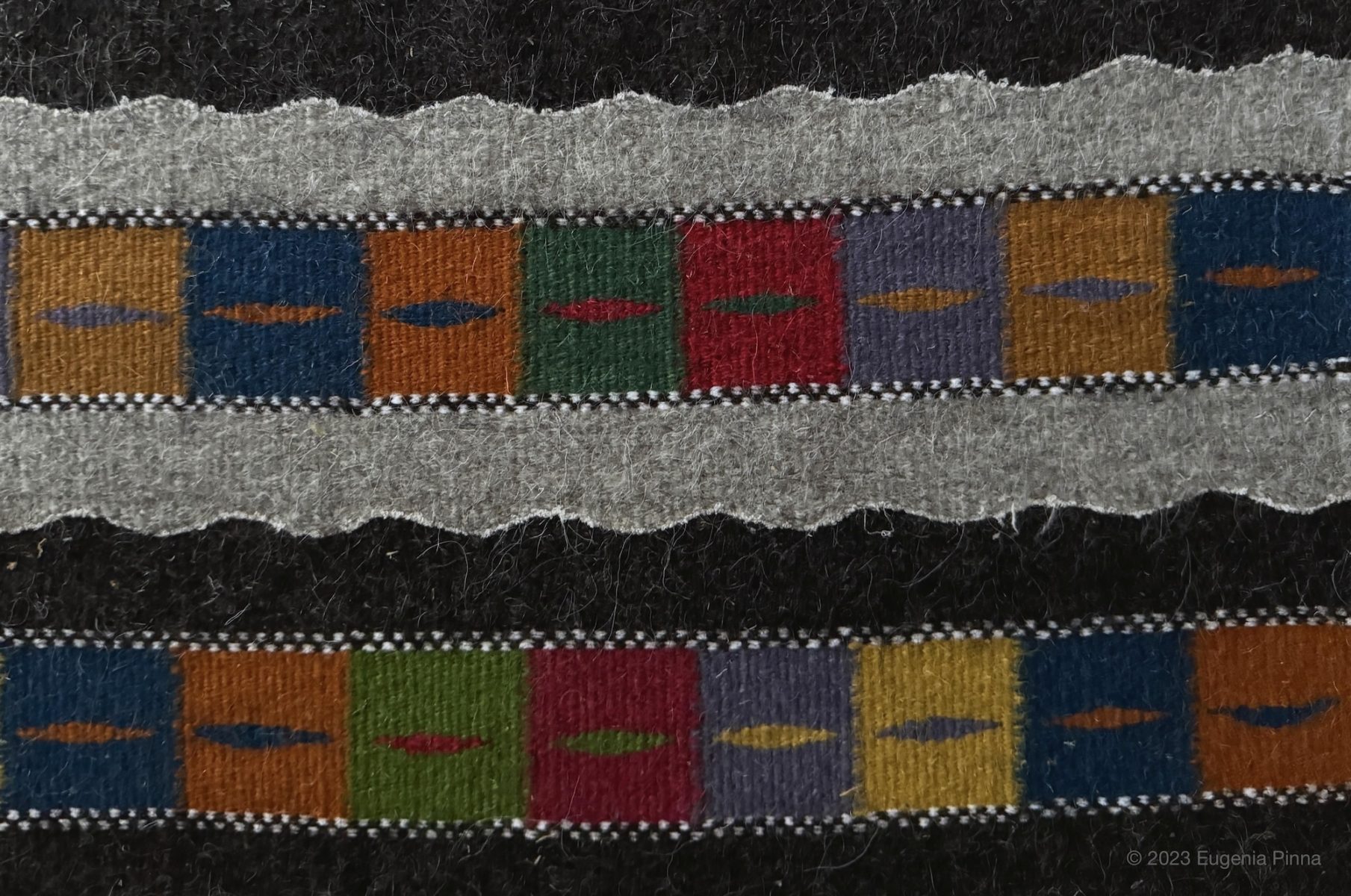 Closeup of rug designed by and copyright Eugenia Pinna. 