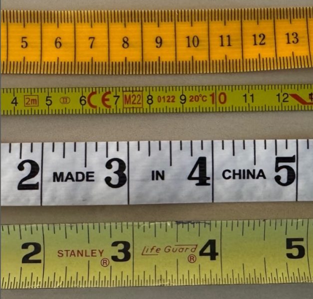 Photo comparing four different tape measures.